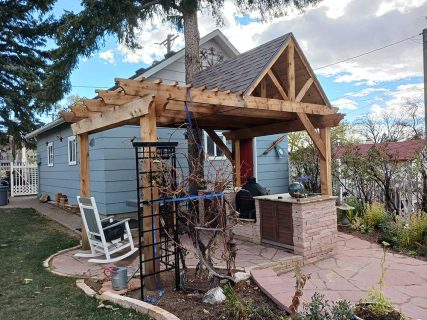 Custom Patio, covered grill area by Sundown Landscaping in Colorado Springs