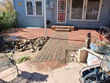 Patio and walkway by Sundown Landscaping